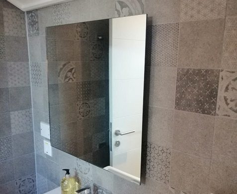 Mirror heater provides a dual purpose, low energy, efficient solution for bathrooms
